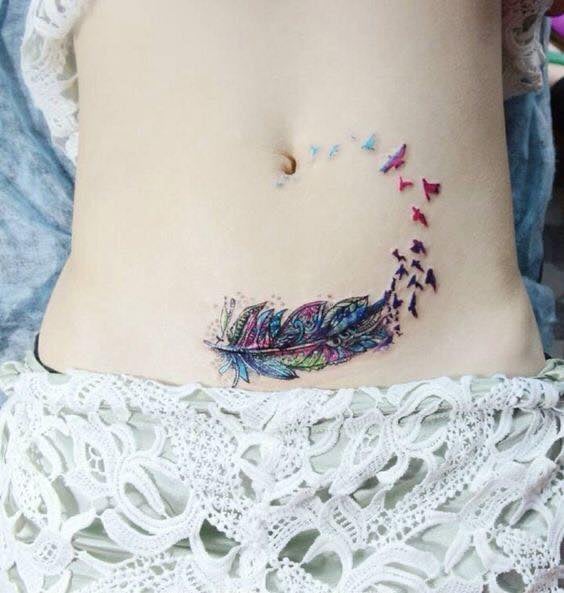 5 TOP 5 Tattoos Abdomen Multicolored feather with birds that come out in a spiral towards the navel red violet fuchsia sky blue
